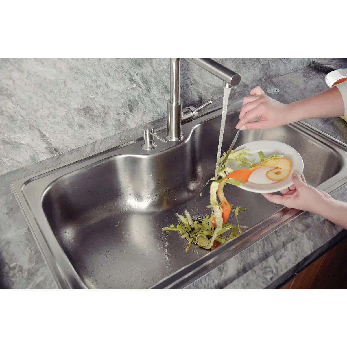 Triturador de Resíduos Alimentares Tramontina para Cubas ou Pias com Furação para Válvula de 4 1/2" com Potência de 0 75 HP 127 V - Versátil